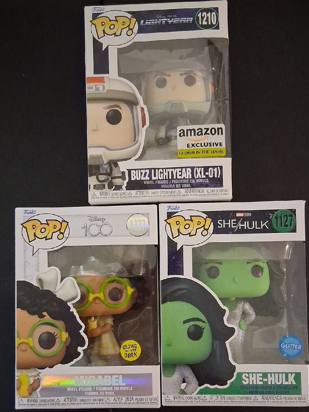 Funko Trio — Green, Yellow, White Buzz Lightyear, Mirabel, She-Hulk